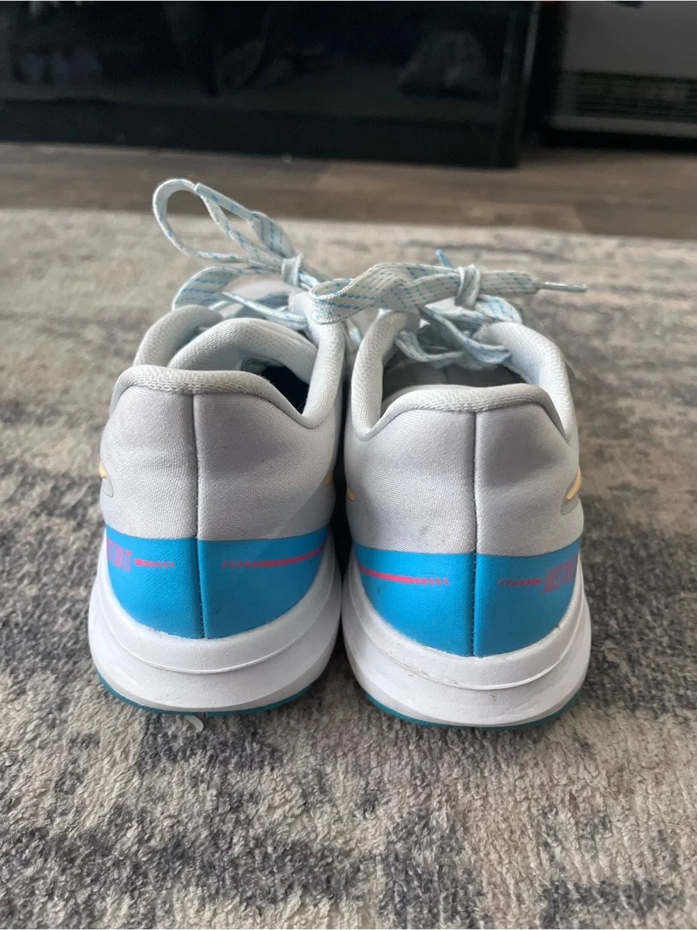 Nike Pale Gray Sneakers with Gold Swoosh and Pink Accents